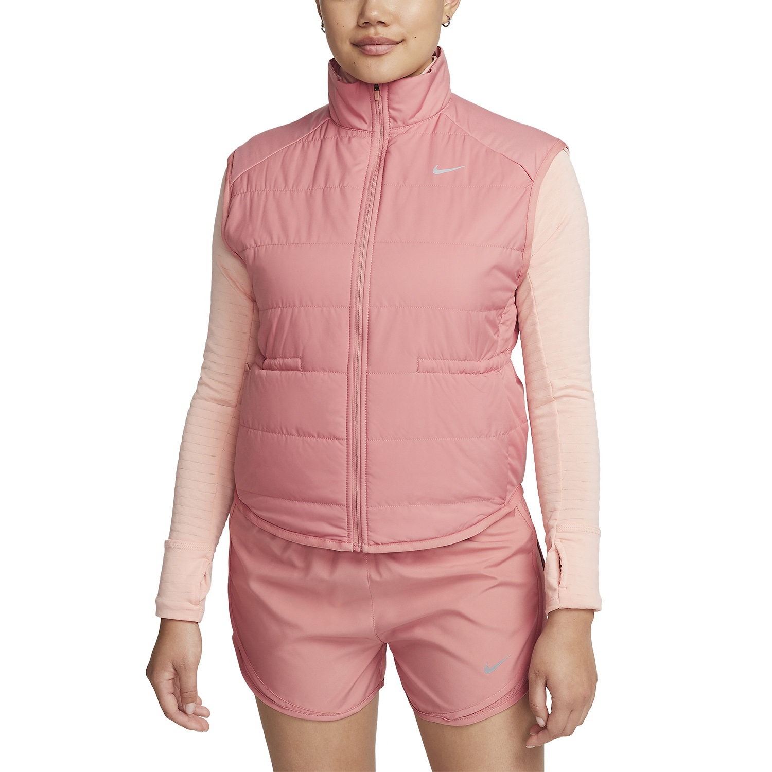 https://www.misterrunning.com/images/2023-media-07/nike-therma-fit-swift-gilet-da-running-donna-red-stardust-fb7537-618_A.jpg